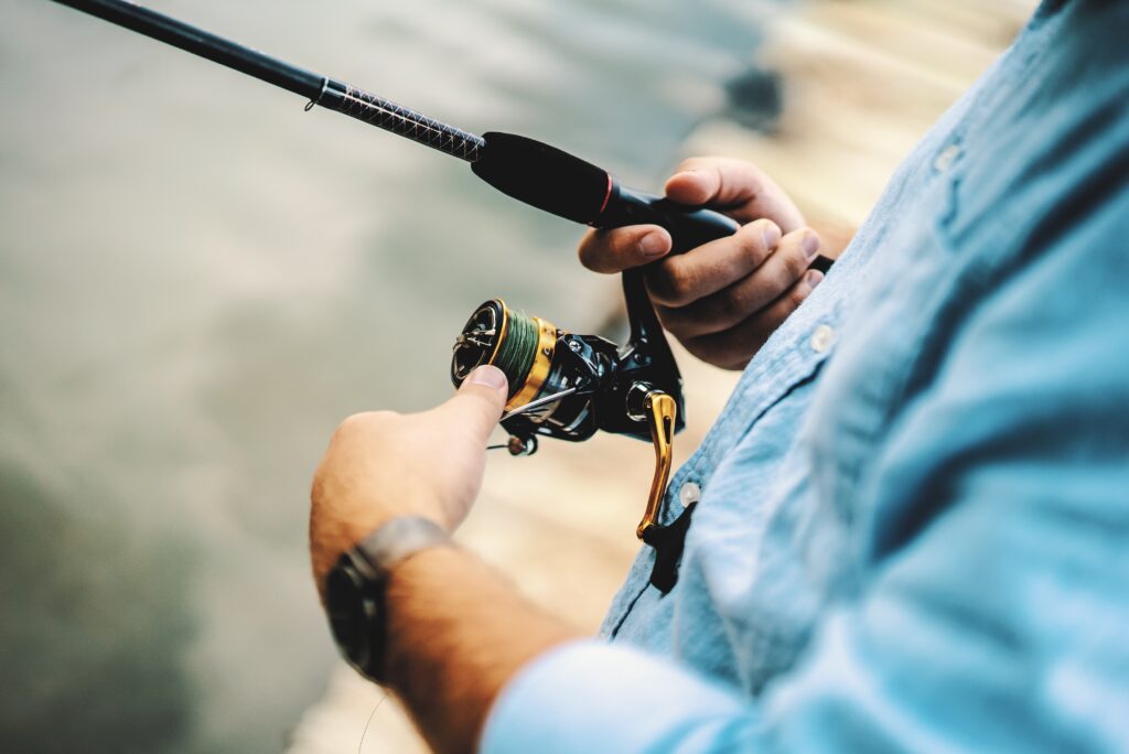 Omega 3 fatty acids- Good fish 12 man holding fishing rod