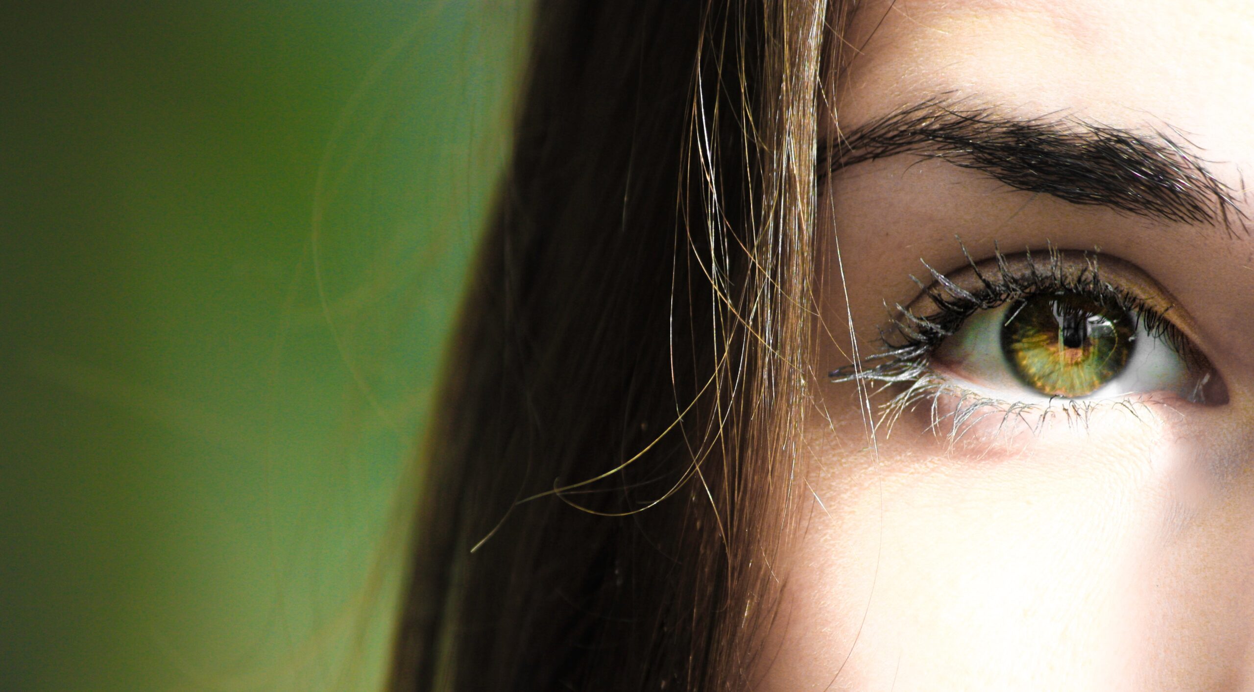 female green eyes close up